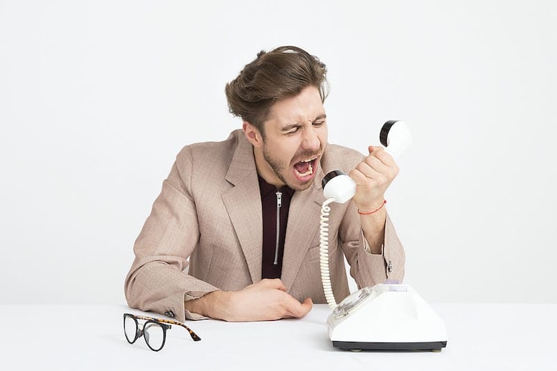 angry man yelling on phone