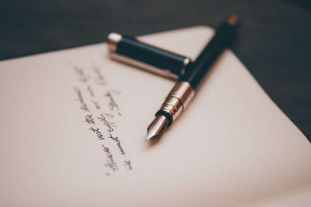 pen on paper writing for seo blogs